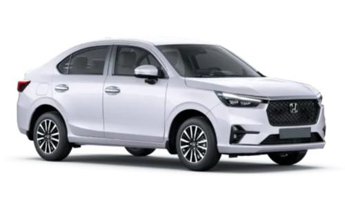 White sedan car used for professional taxi service in Dehradun for local and outstation travel.