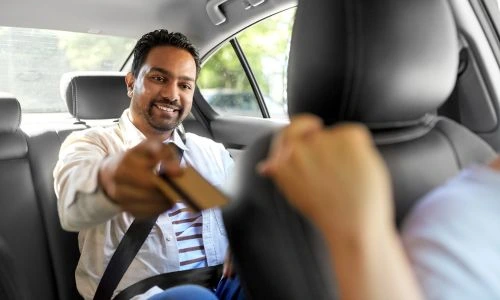 Tourist enjoying comfortable tourism-focused taxi service in Dehradun
